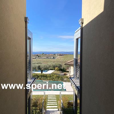 Immobiliare Speri | Verkauf - wunderschöne Penthouse mit  Seeblick - 