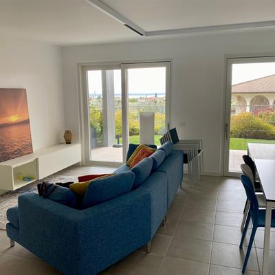 Immobiliare Speri | Verkauf - Erdgeschosswohnung mit Seeblick - 