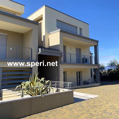 Immobiliare Speri | Verkauf - Erdgeschosswohnung mit Seeblick - 